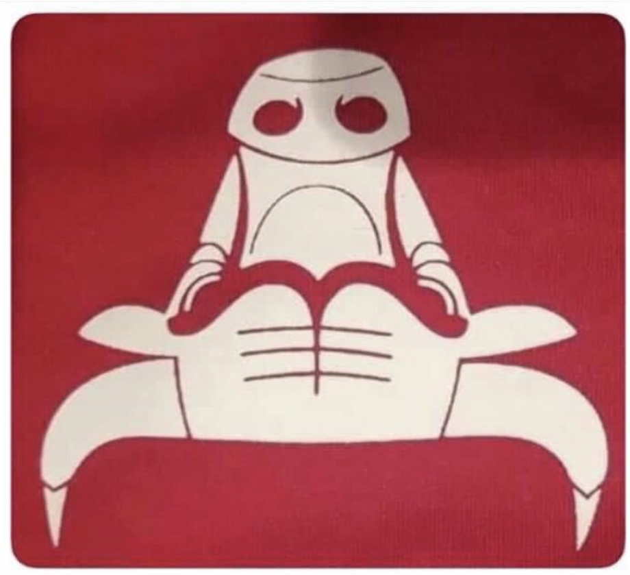 The same bull logo in the original image inverted. Upside-down, it does indeed look like a robot violating a crab.