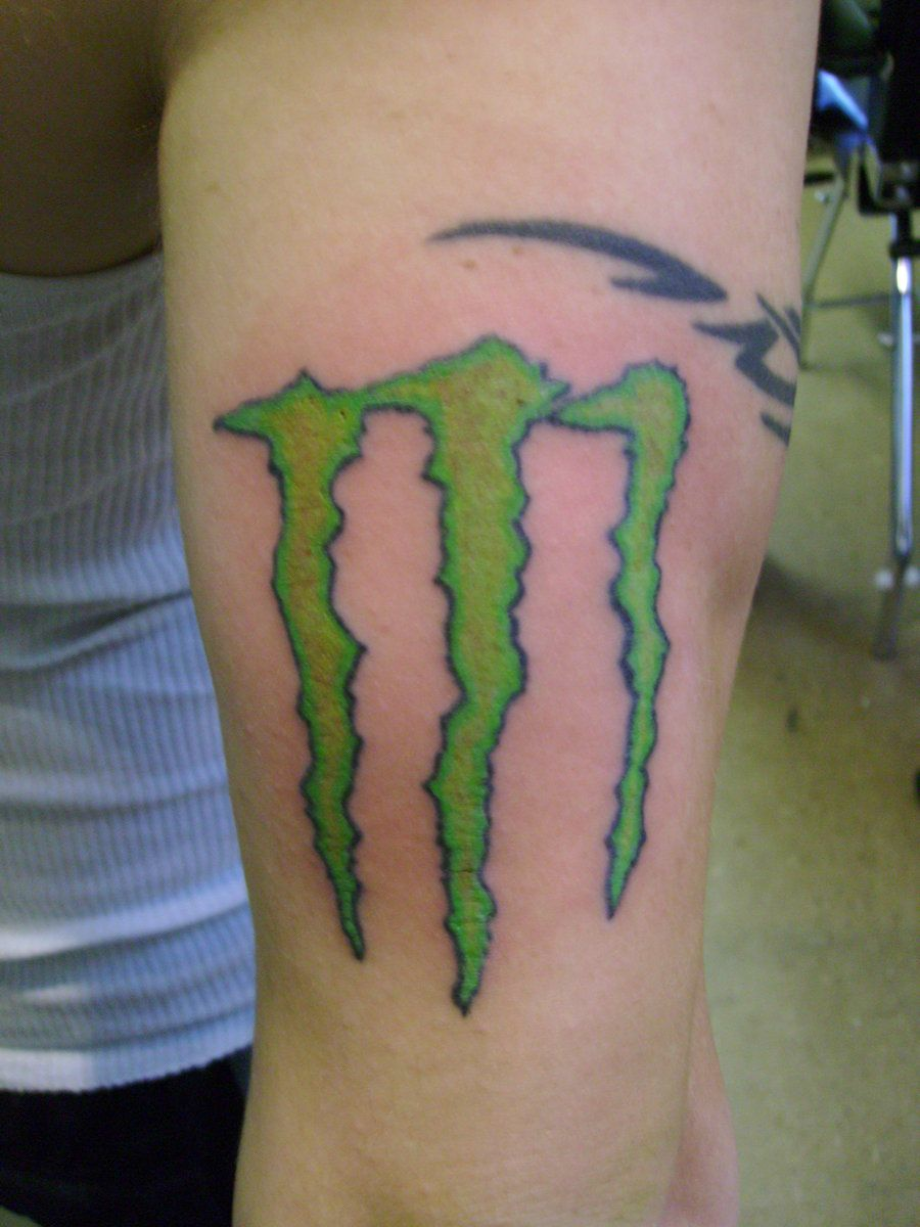 monster logo tattoo