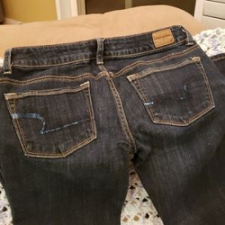 American Eagle jeans shiny logos on pocket