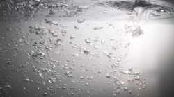 Air Bubbles in Crystal Clear Transparent Water on A White ...