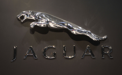The logo for Jaguar on display at the Chicago Auto Show ...