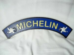 Details about Cast Iron MICHELIN MAN Bibendum With Tires Curved Advertising  Wall Sign Plaque