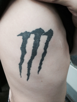 Monster logo on side of chest lol | Tattoos, Friend tattoos ...