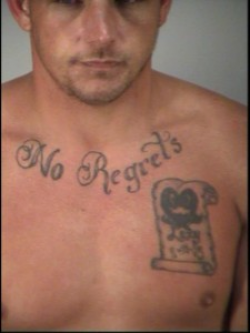 Distinctive tattoos lead police to suspect who passed ...