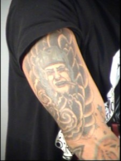 Distinctive tattoos lead police to suspect who passed ...