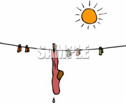 A Sock Hanging on a Clothesline To Dry - Royalty Free ...