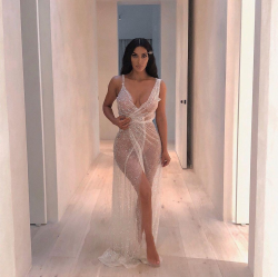 Kim Kardashian poses in totally see-through dress during ...