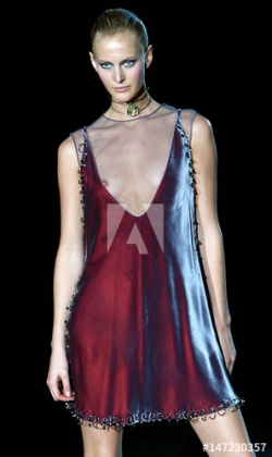 A model wears a semi transparent dress as part of ...