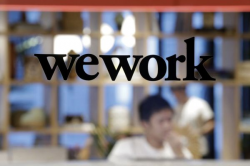 WeWork Says It\'s Laying Off 2,400 Employees Globally | Time