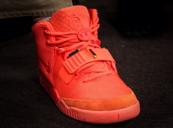 Justin Tuck in Red October Yeezy 2 - SneakerNews.com